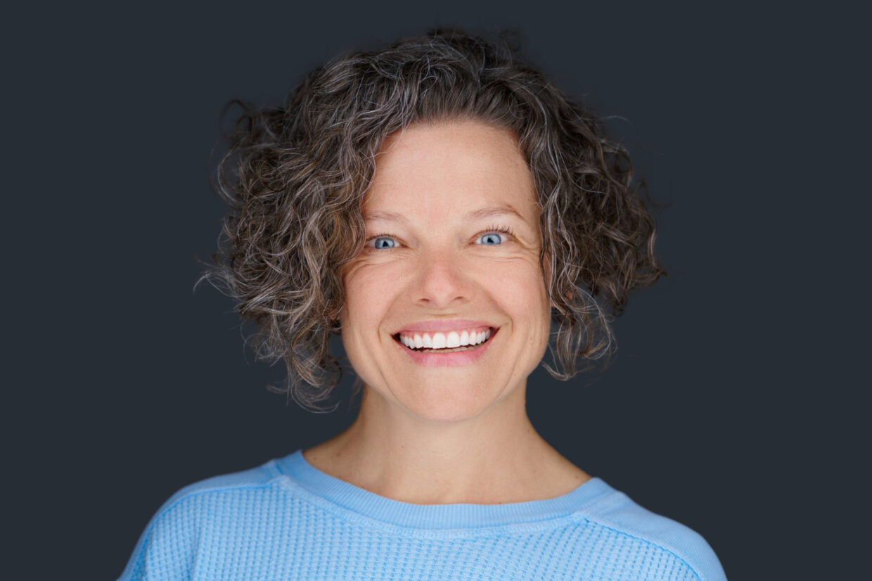 headshot of Cypress Willett in a blue sweater
